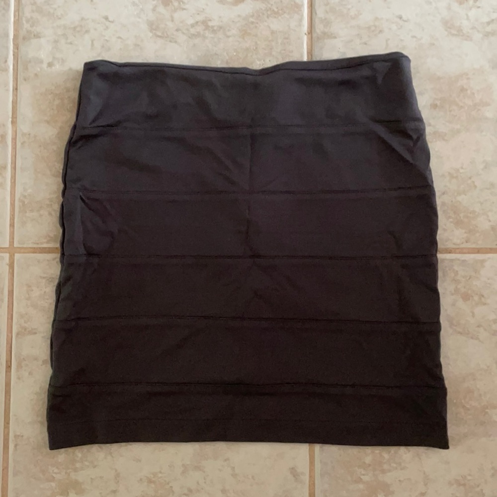Dark grey, textured mini skirt with back zipper.